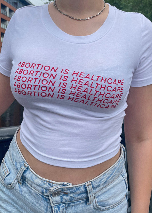 Abortion is healthcare baby tee