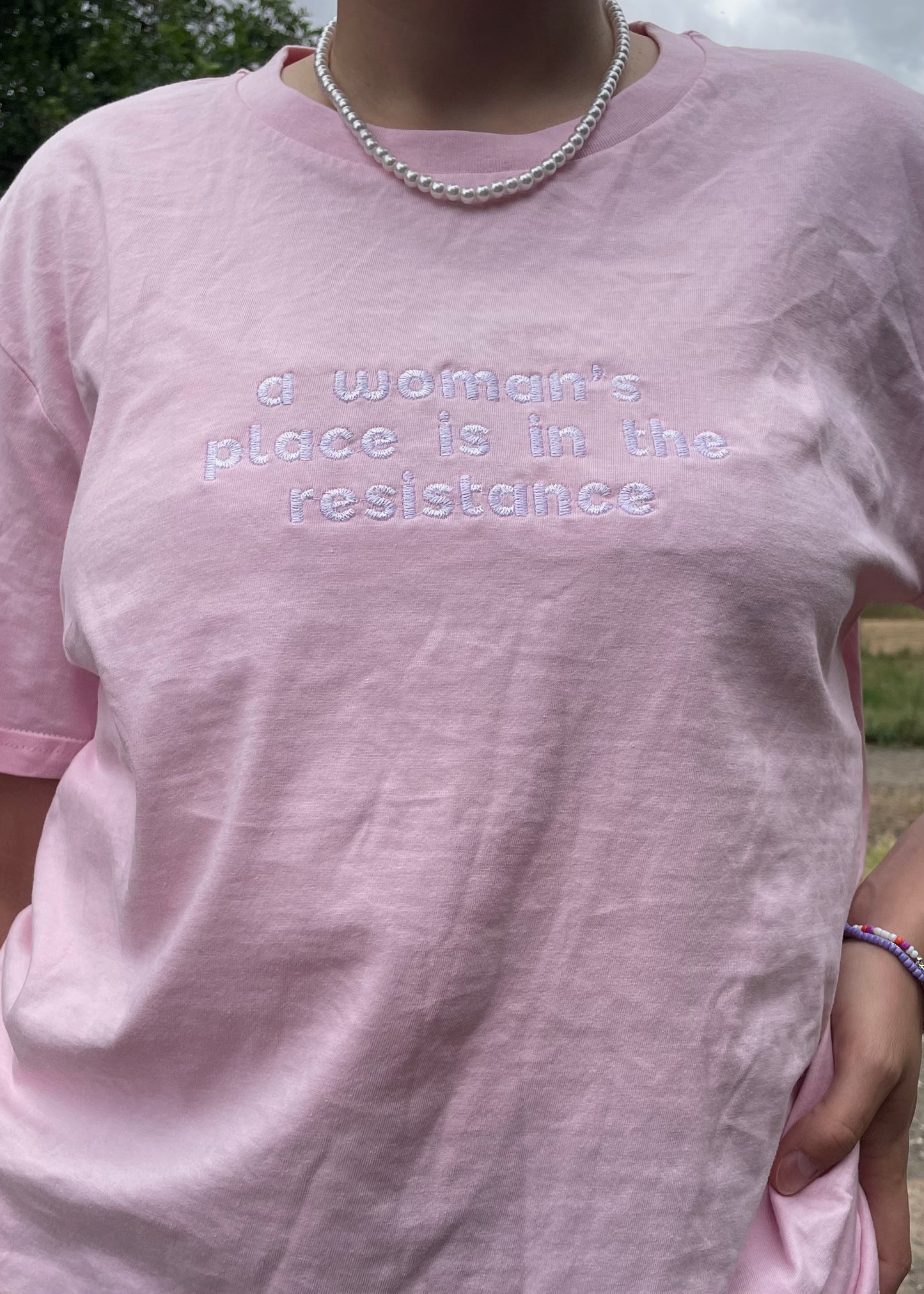 A WOMAN'S PLACE.. PINK TEE